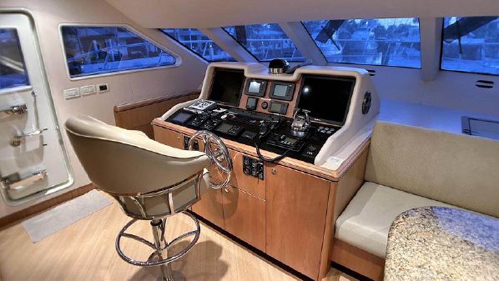 a room with a desk and a chair aboard 2006 CHEOY LEE MOTOR Yacht for Sale