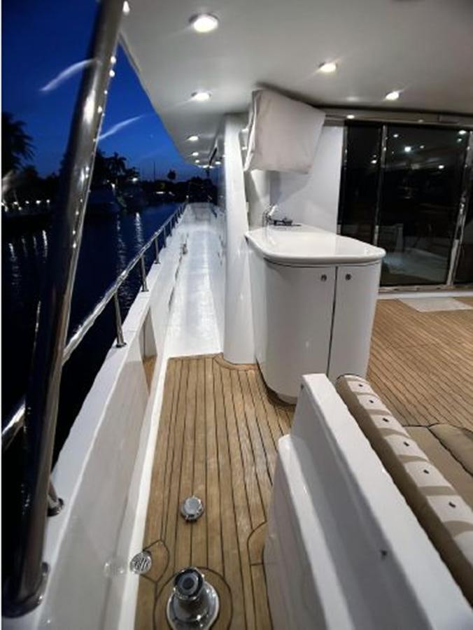 a bathroom with a large tub aboard 2006 CHEOY LEE MOTOR Yacht for Sale