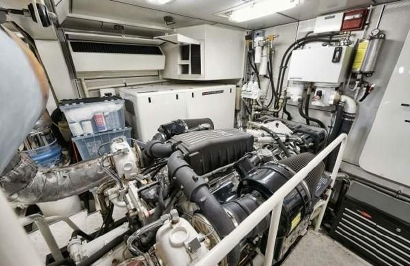 a machine in a room aboard 2006 CHEOY LEE MOTOR Yacht for Sale