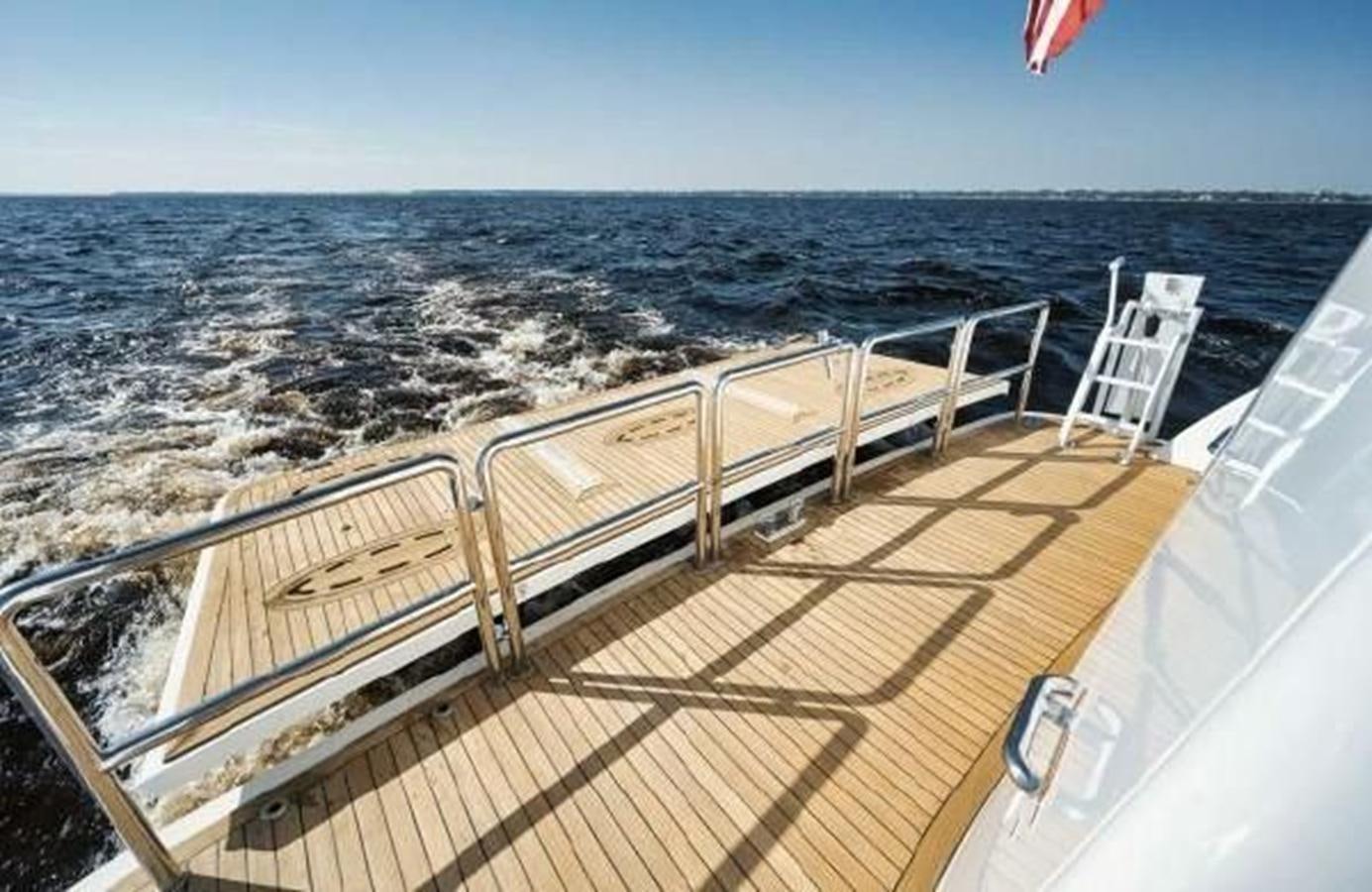 a deck overlooking the ocean aboard 2006 CHEOY LEE MOTOR Yacht for Sale