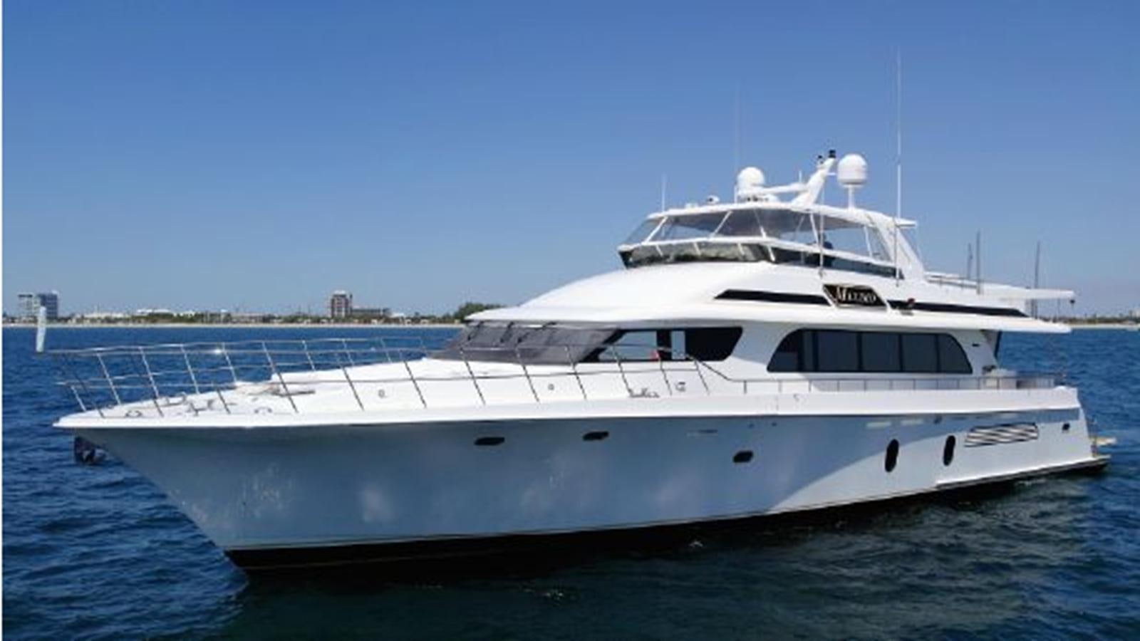 a large white yacht aboard 2006 CHEOY LEE MOTOR Yacht for Sale