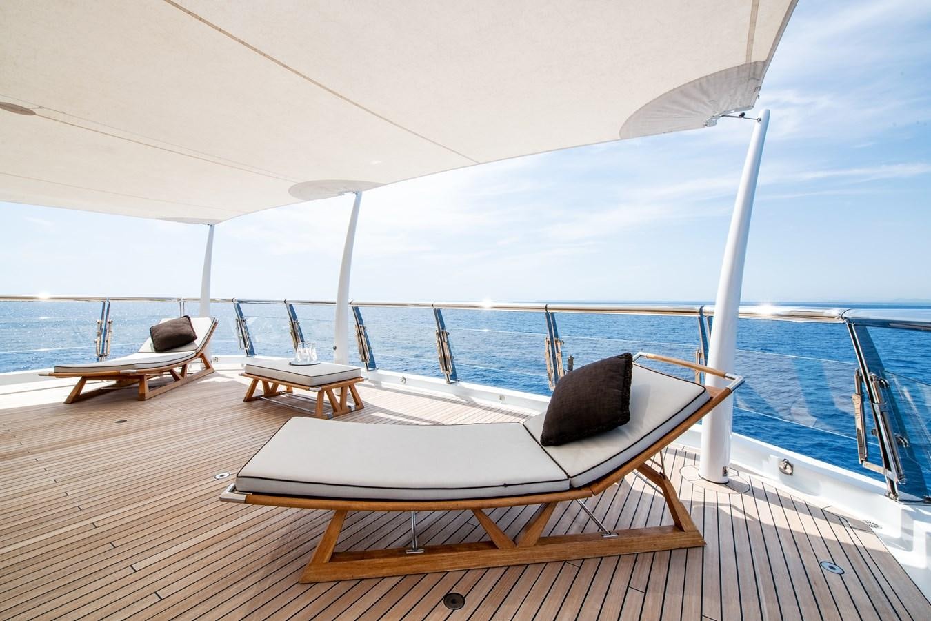 a lounge chair on a deck aboard AALTO Yacht for Sale