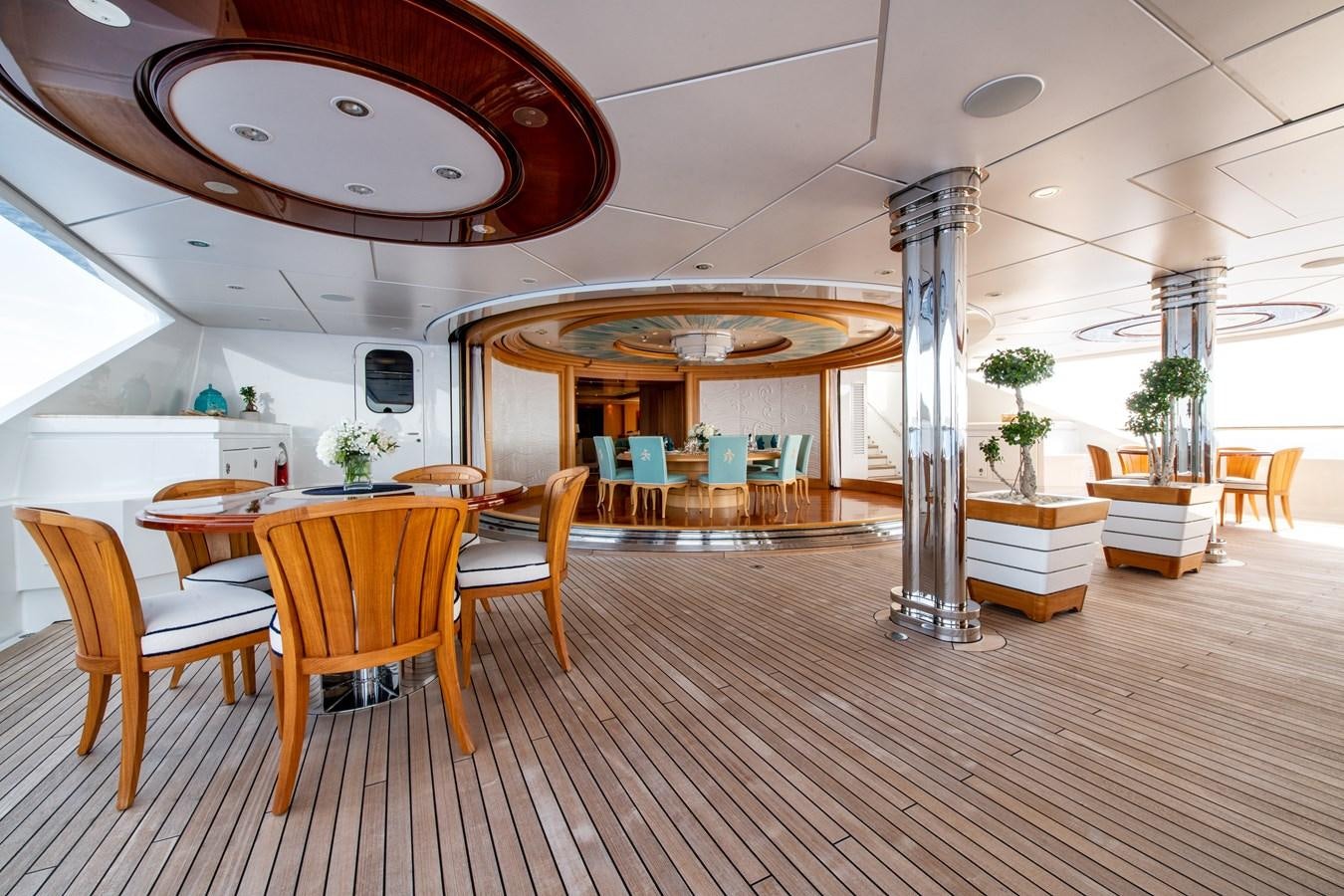 a large room with tables and chairs aboard AALTO Yacht for Sale