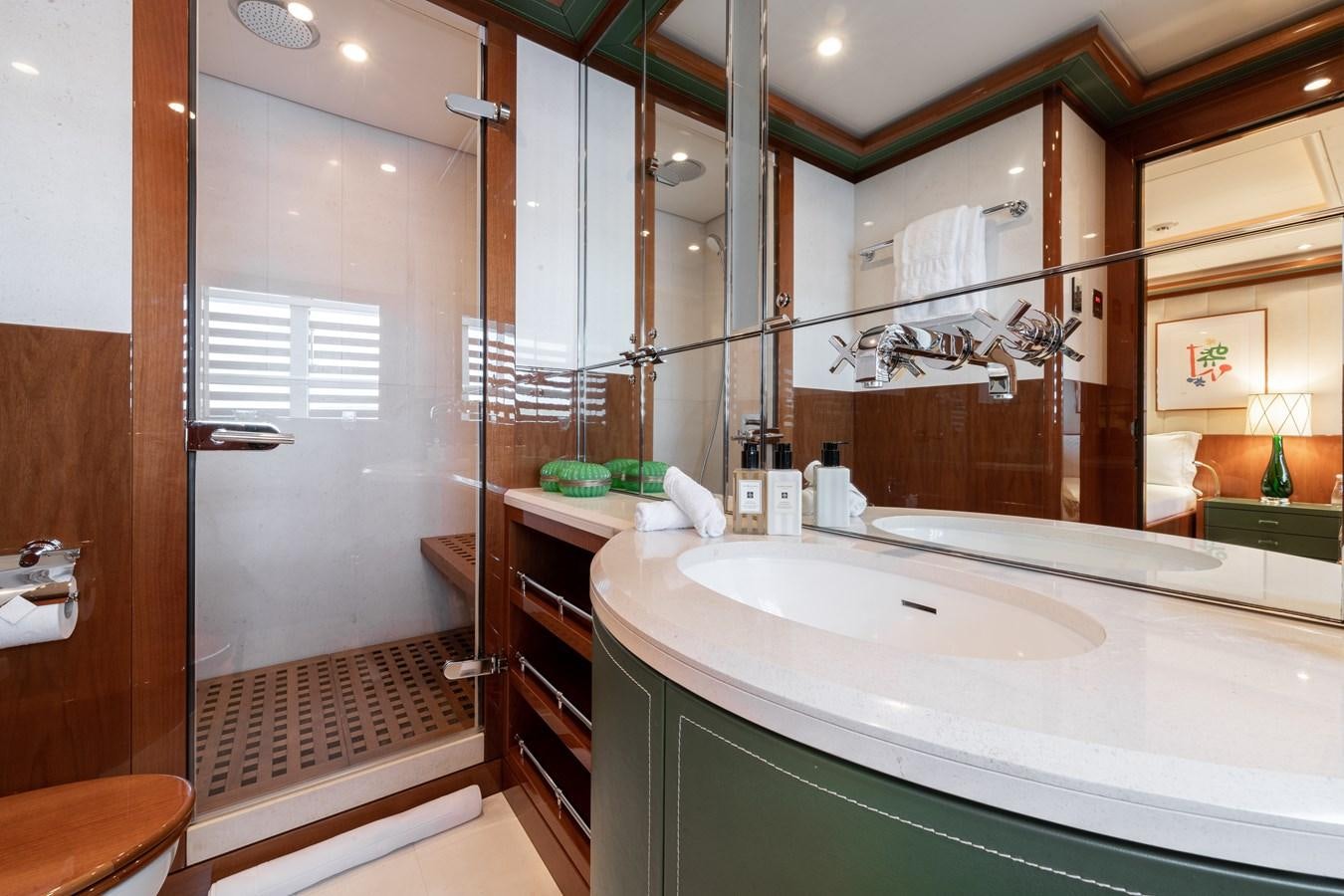 a bathroom with a large mirror aboard AALTO Yacht for Sale