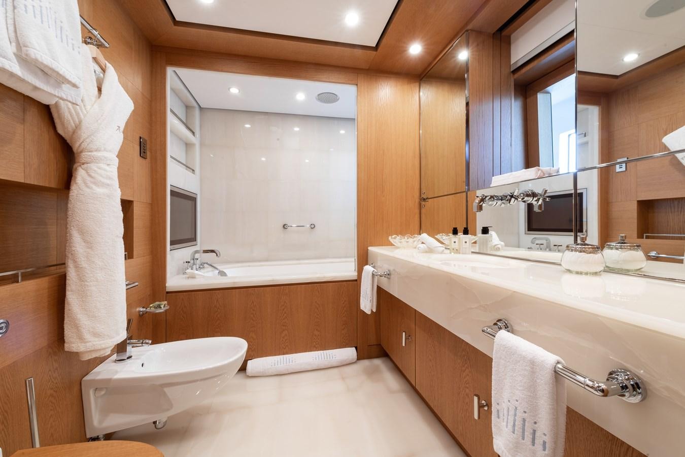 a bathroom with a sink and a bathtub aboard AALTO Yacht for Sale