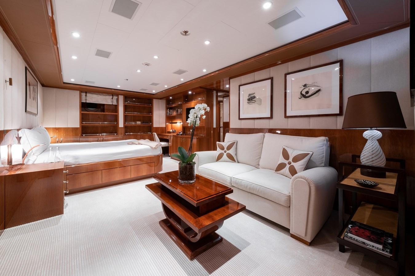 a living room with a bed and a coffee table aboard AALTO Yacht for Sale