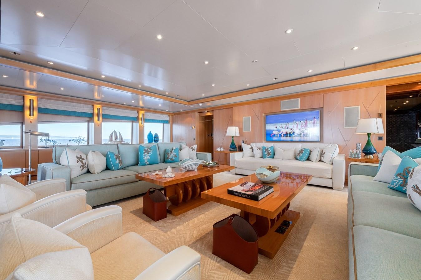a living room with a large screen aboard AALTO Yacht for Sale