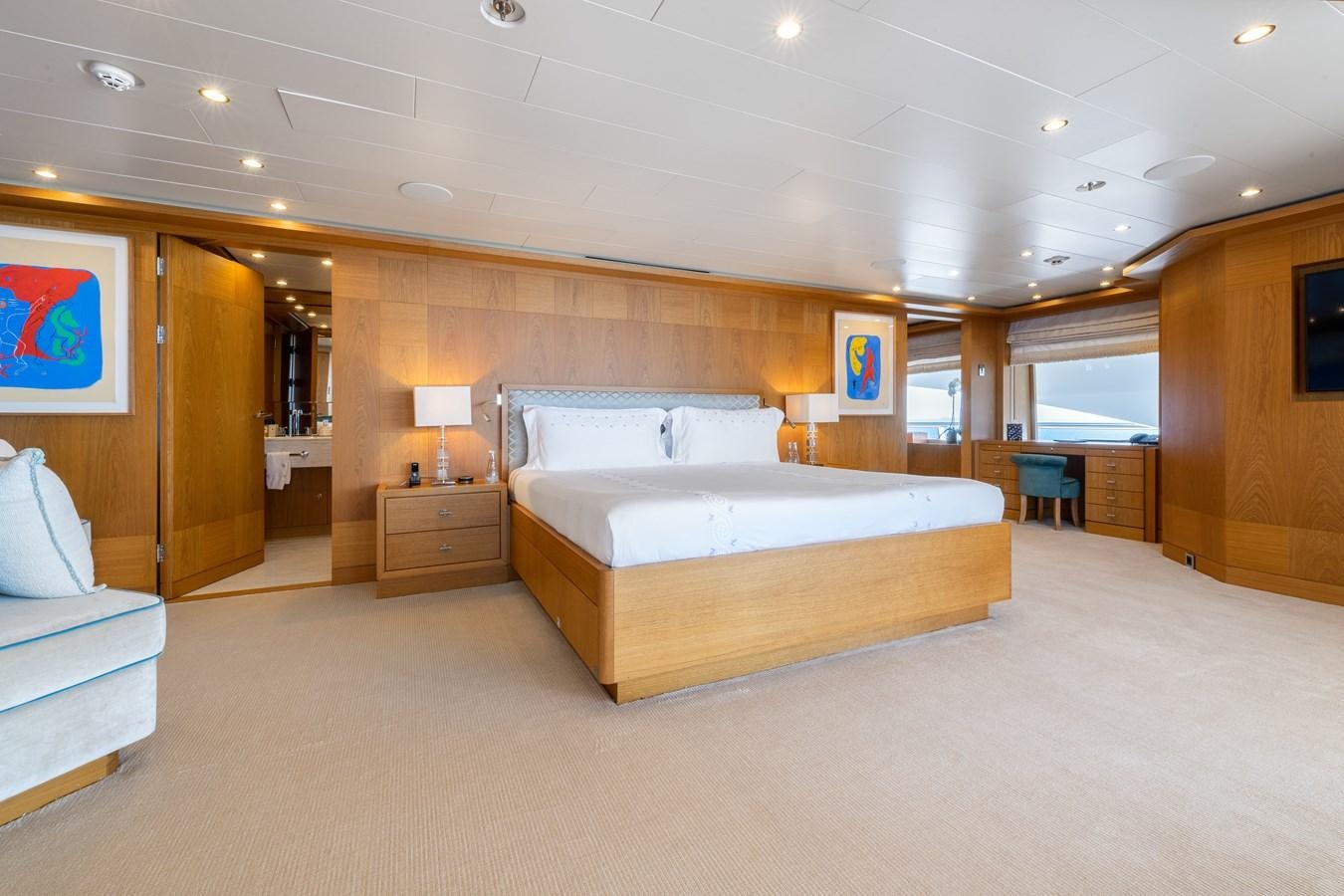 a large bedroom with a large bed aboard AALTO Yacht for Sale