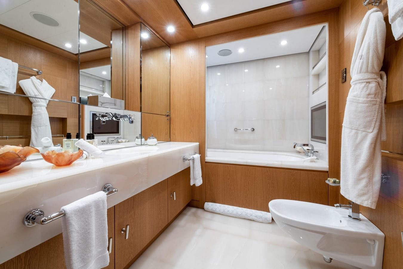 a bathroom with a sink and a bathtub aboard AALTO Yacht for Sale