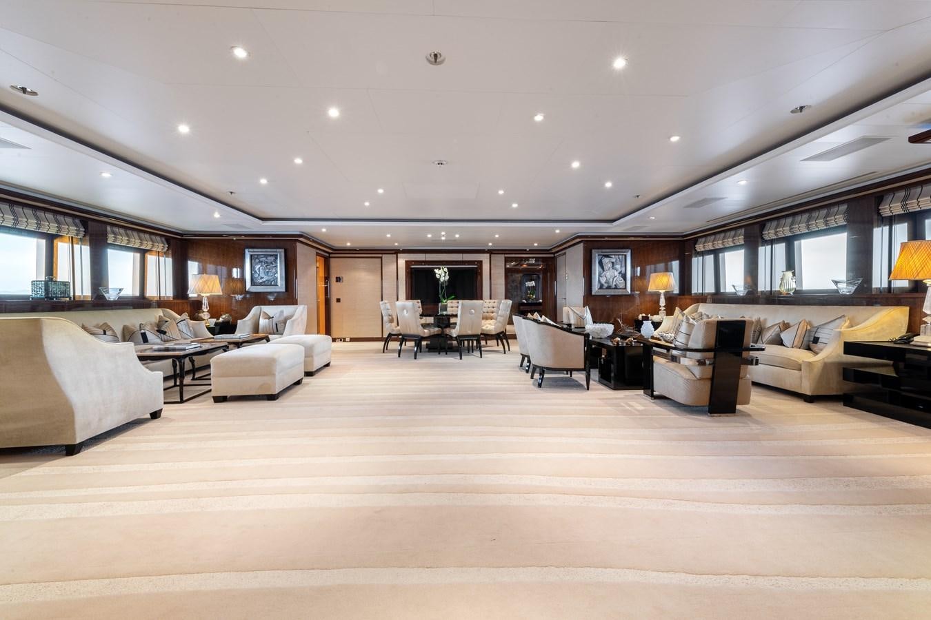a large living room with a large bed and a couch aboard AALTO Yacht for Sale