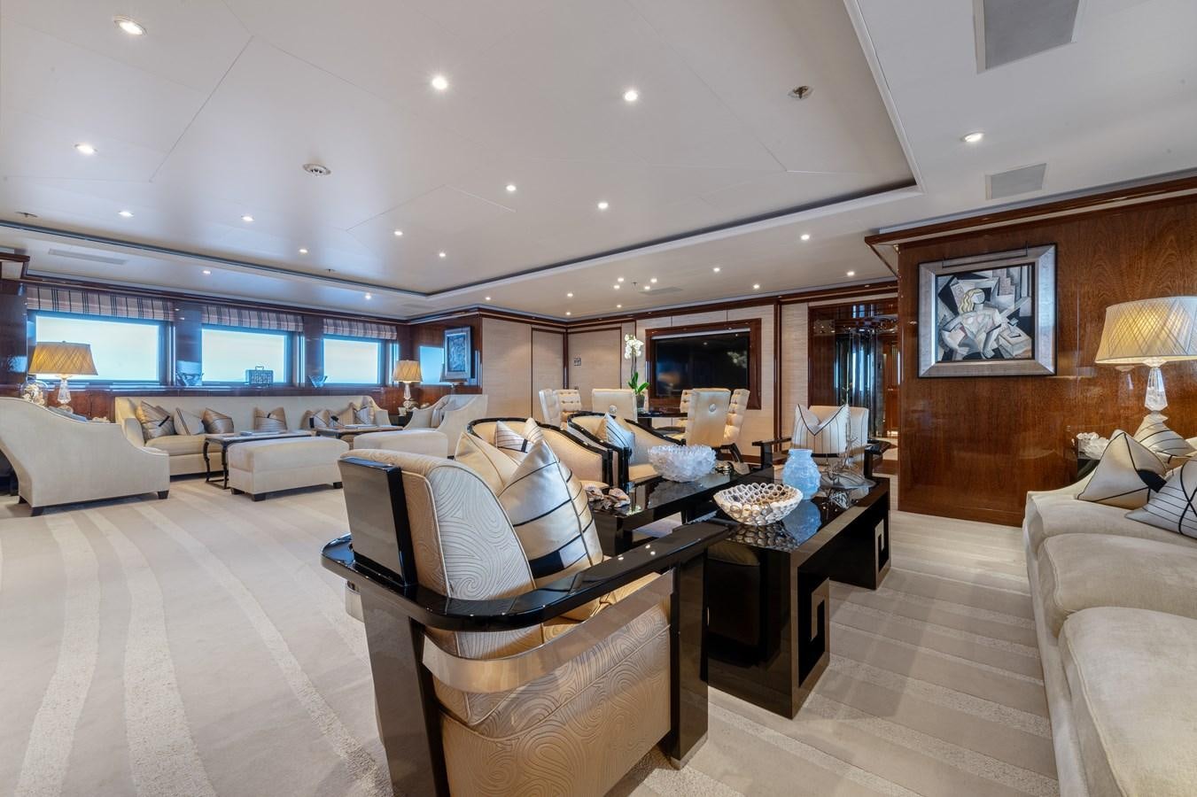 a living room with a large bed and a large window aboard AALTO Yacht for Sale