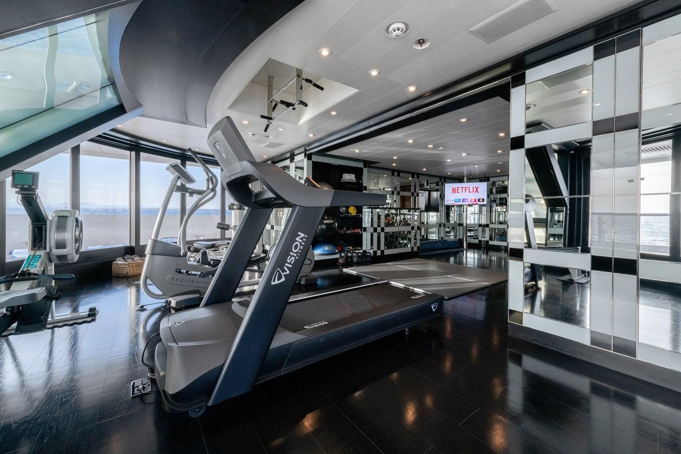 a treadmill in a gym aboard AALTO Yacht for Sale