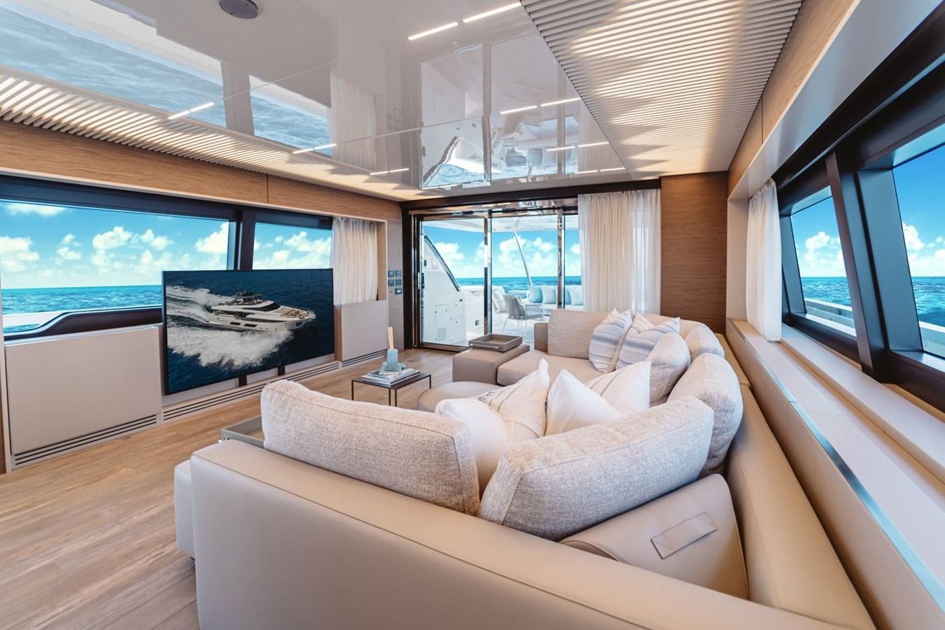 a living room with a large screen aboard FERRETTI YACHTS 920 HT  Yacht for Sale