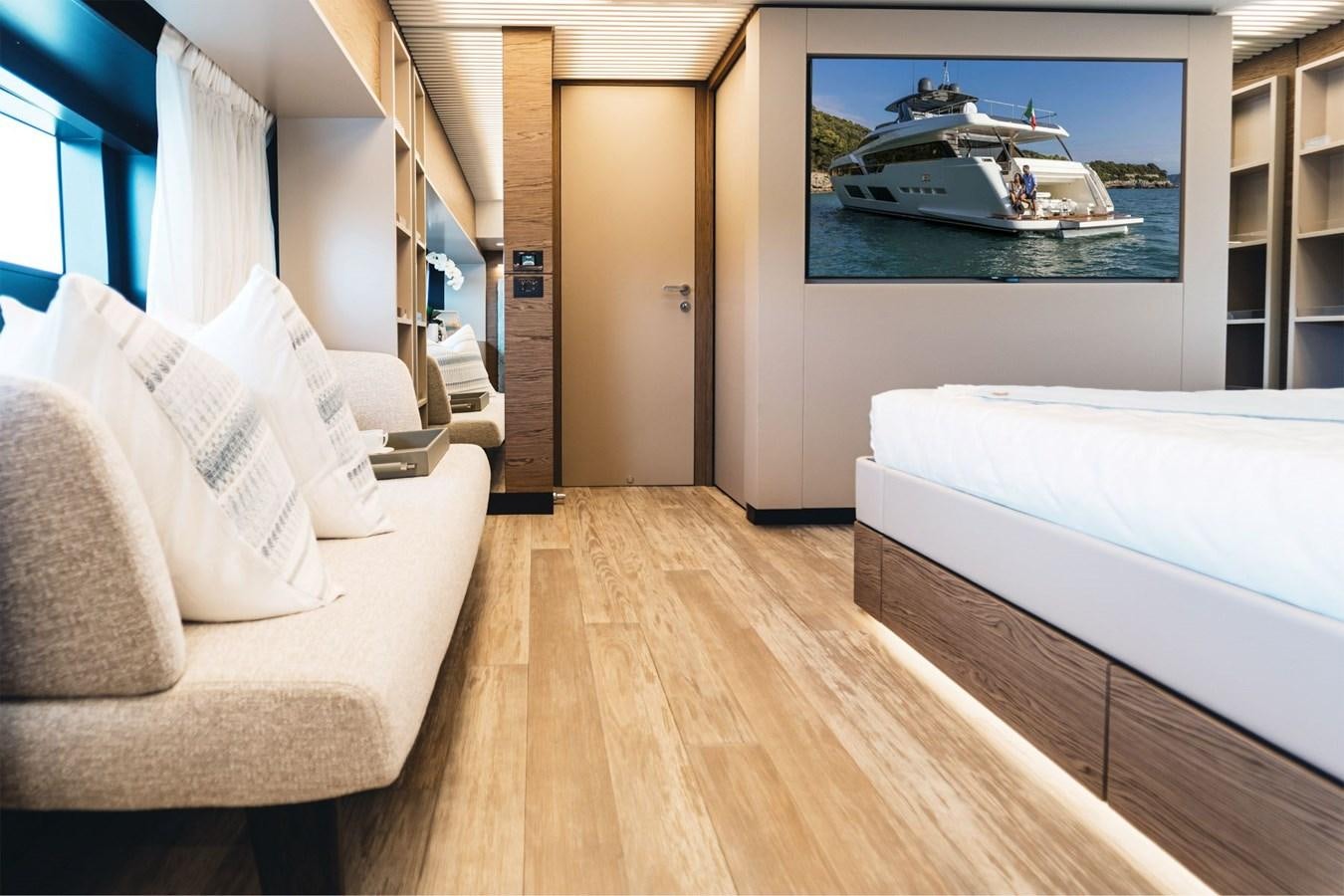 a bedroom with a bed and a television aboard FERRETTI YACHTS 920 HT  Yacht for Sale