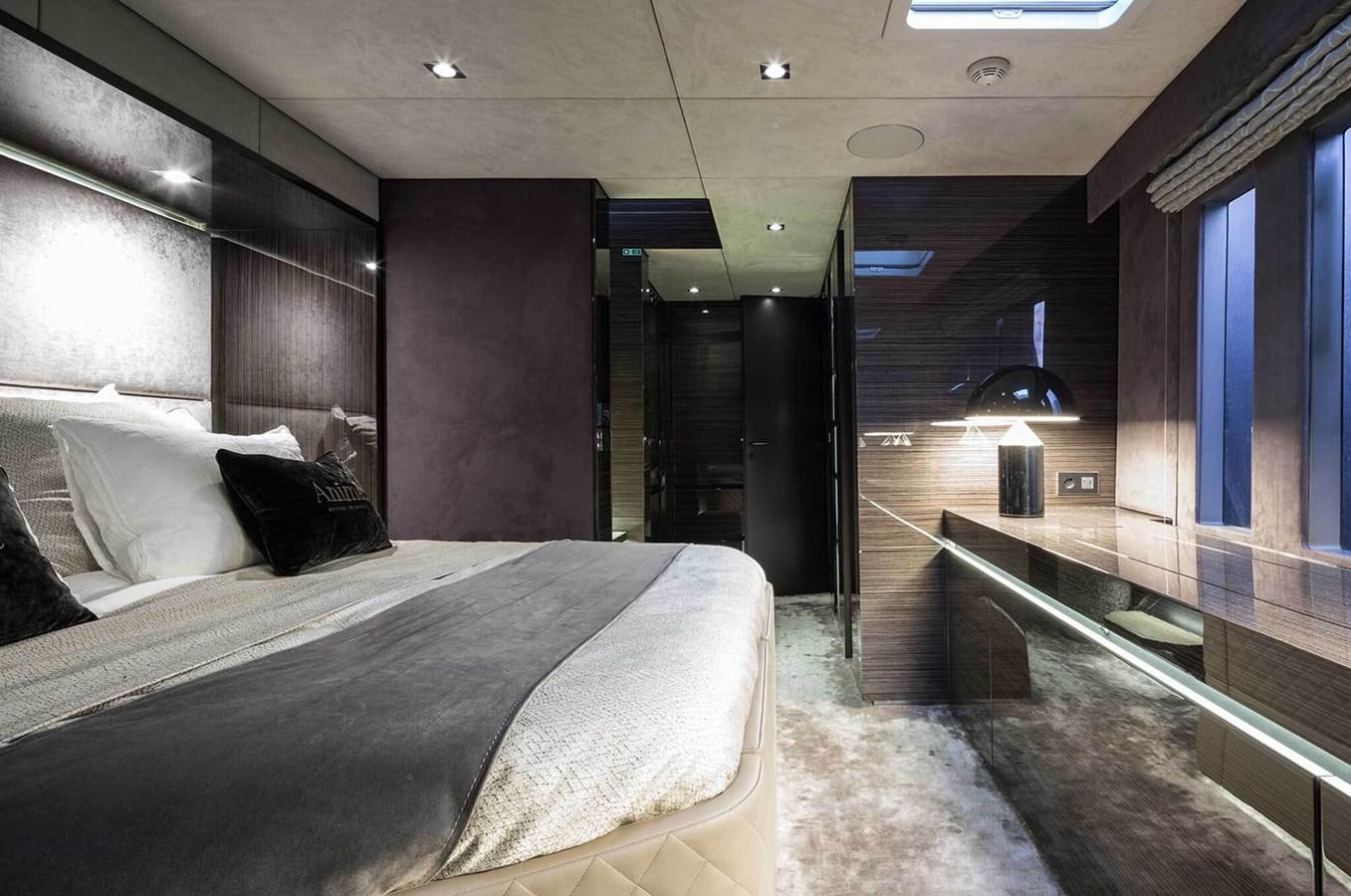 a bed in a room aboard ANIMA Yacht for Sale