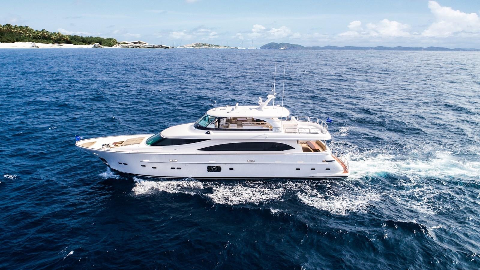 a white boat on the water aboard HORIZON E100 Yacht for Sale