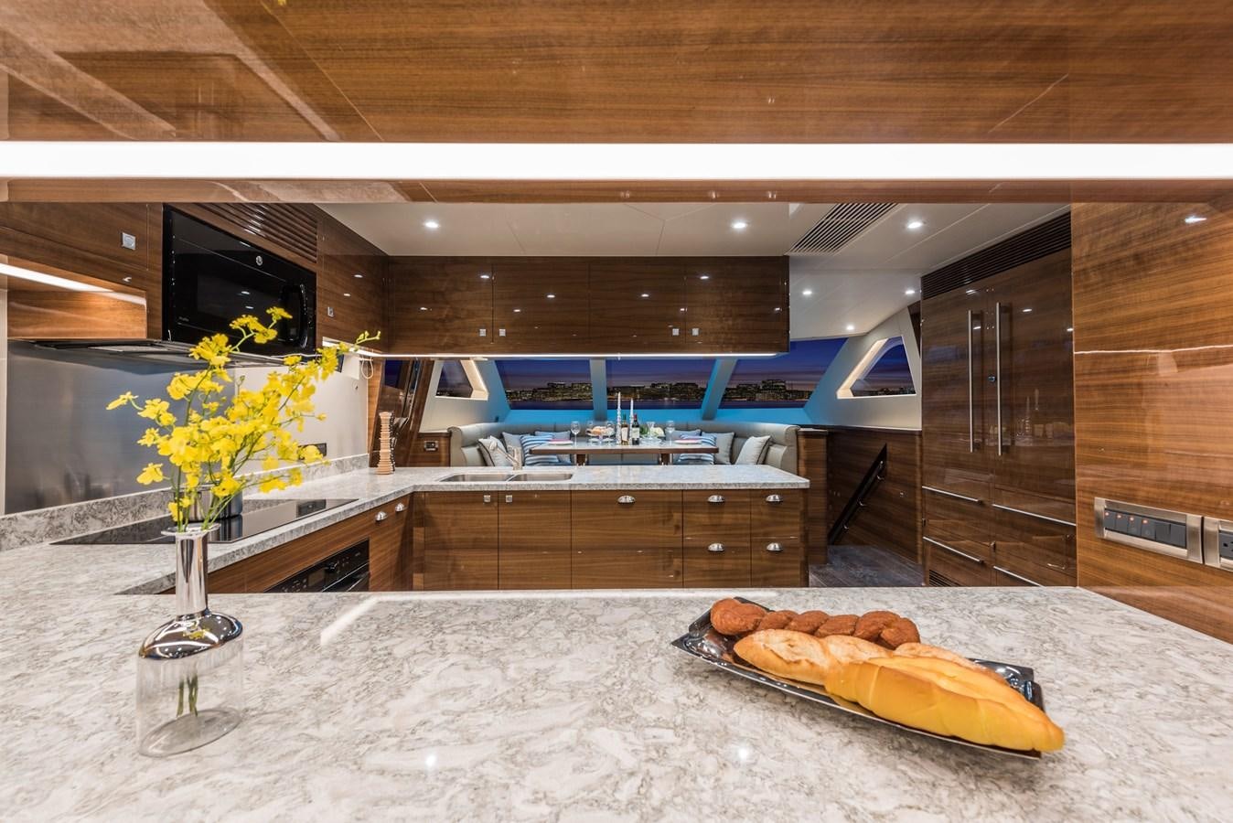 a kitchen with a large countertop aboard HORIZON E100 Yacht for Sale