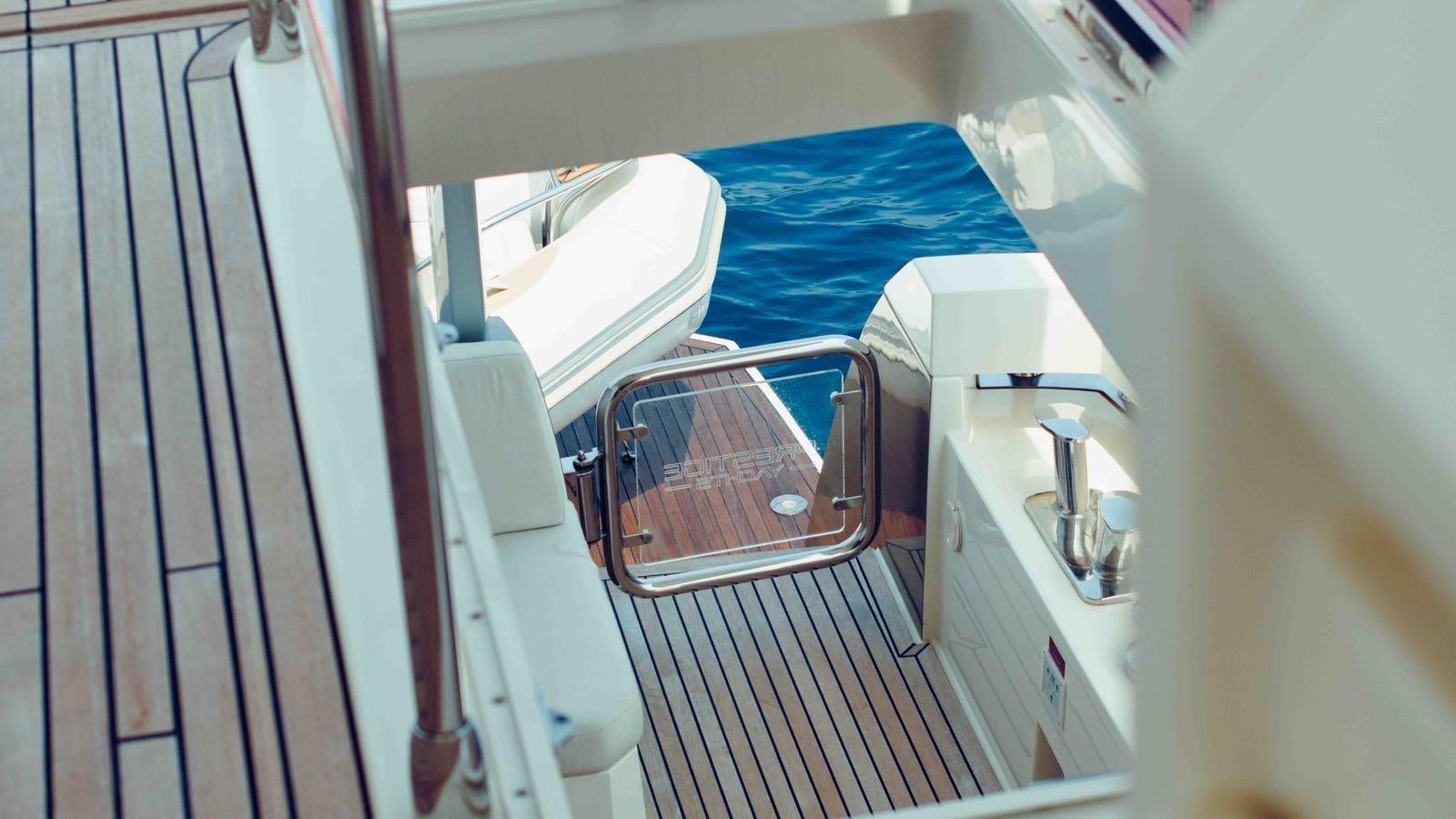 a boat with a blue sheet aboard FEU D'OR Yacht for Sale