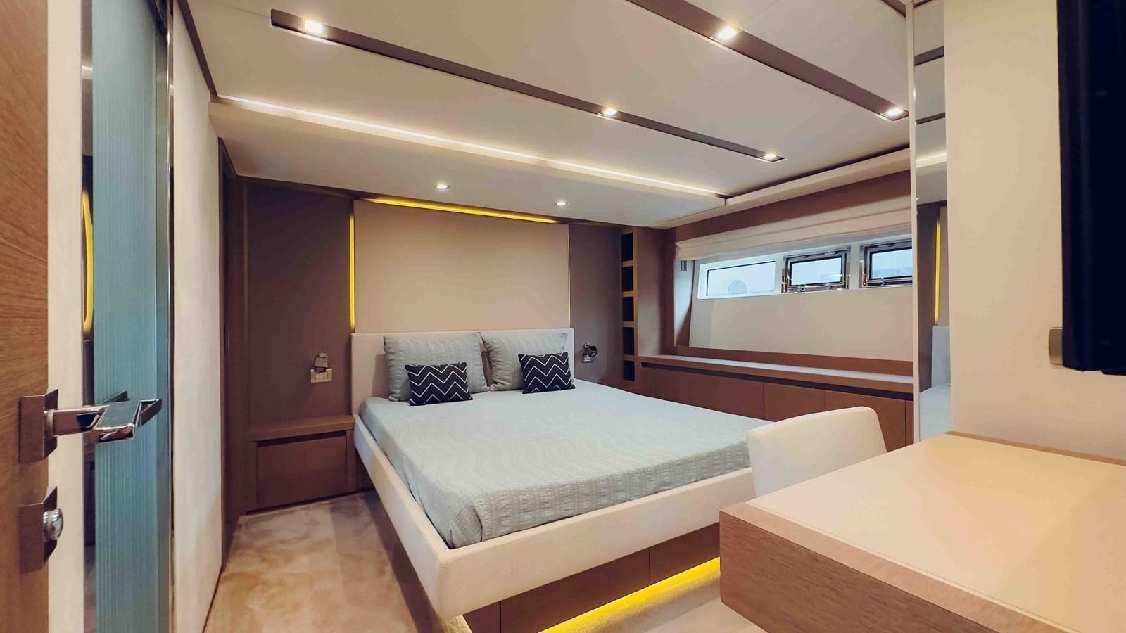 a bed in a room aboard FEU D'OR Yacht for Sale