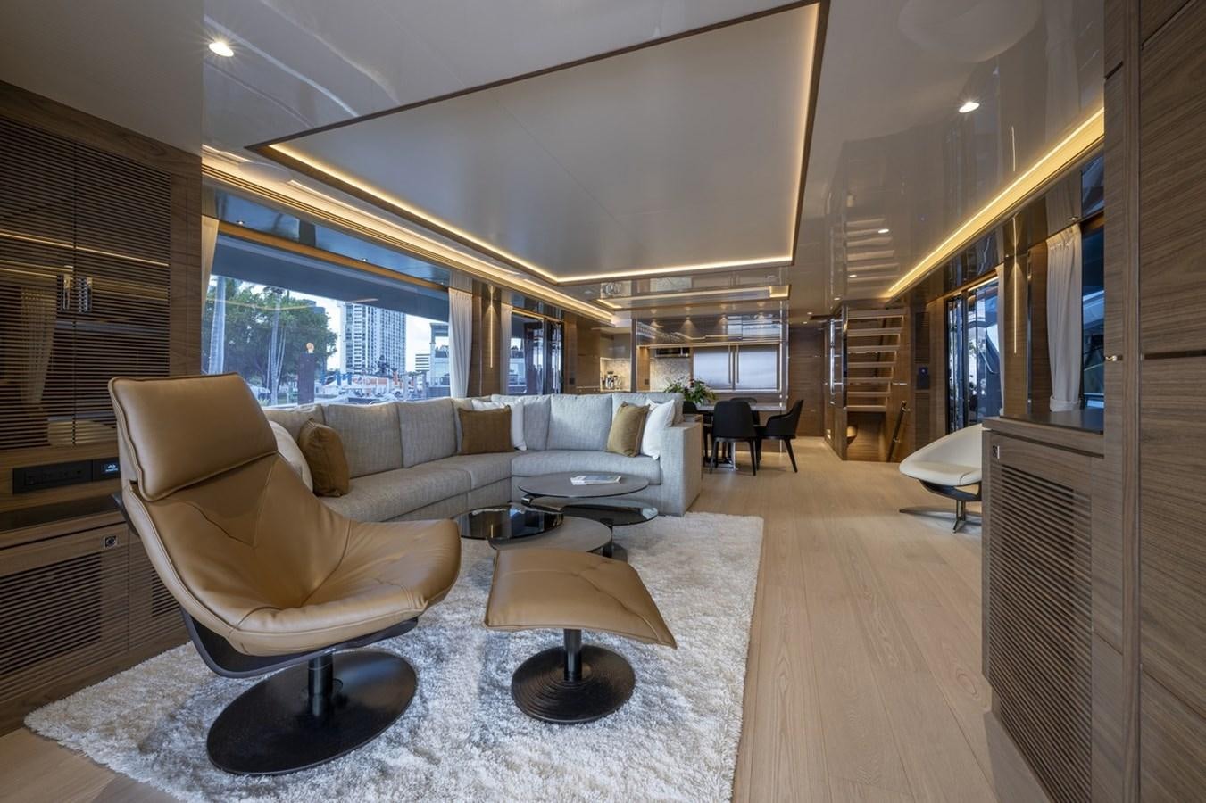 a living room with a large window aboard FD80 Yacht for Sale
