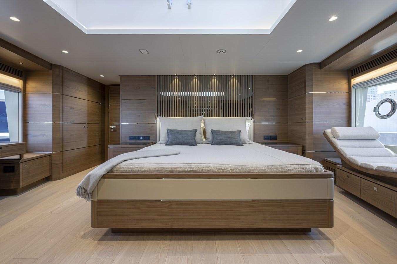 a large bed in a room aboard FD80 Yacht for Sale