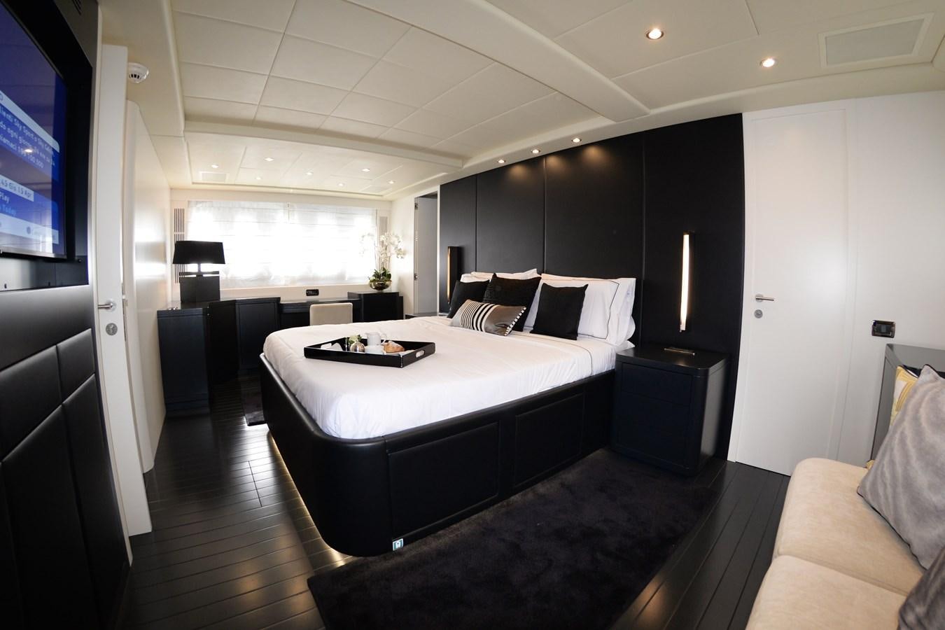a large bedroom with a large bed aboard ONLY ONE Yacht for Sale