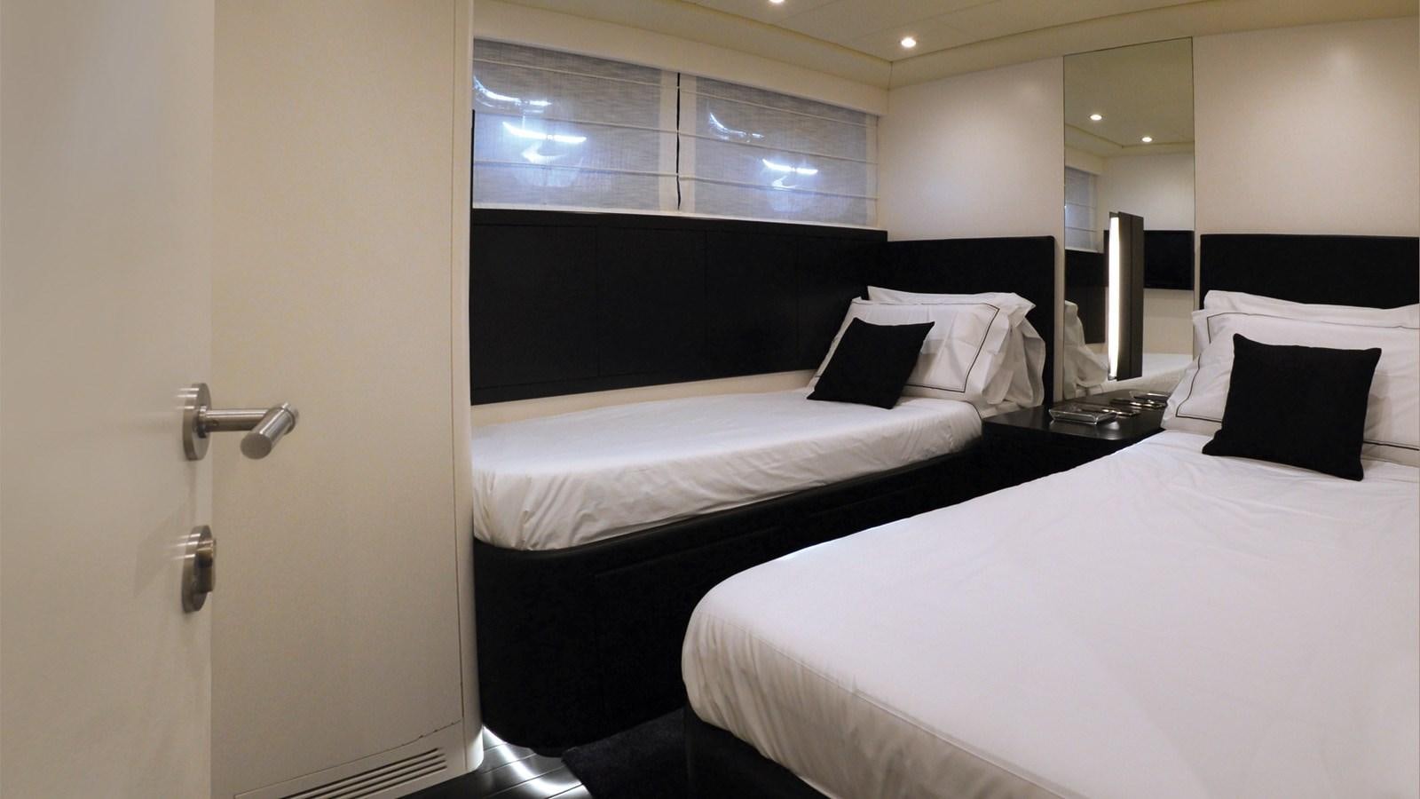 a room with two beds aboard ONLY ONE Yacht for Sale