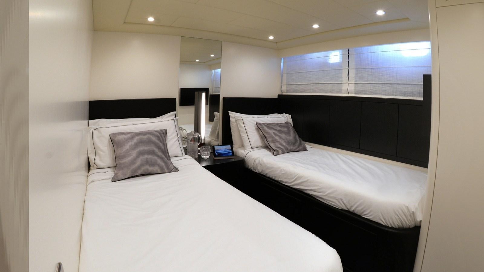a room with two beds aboard ONLY ONE Yacht for Sale