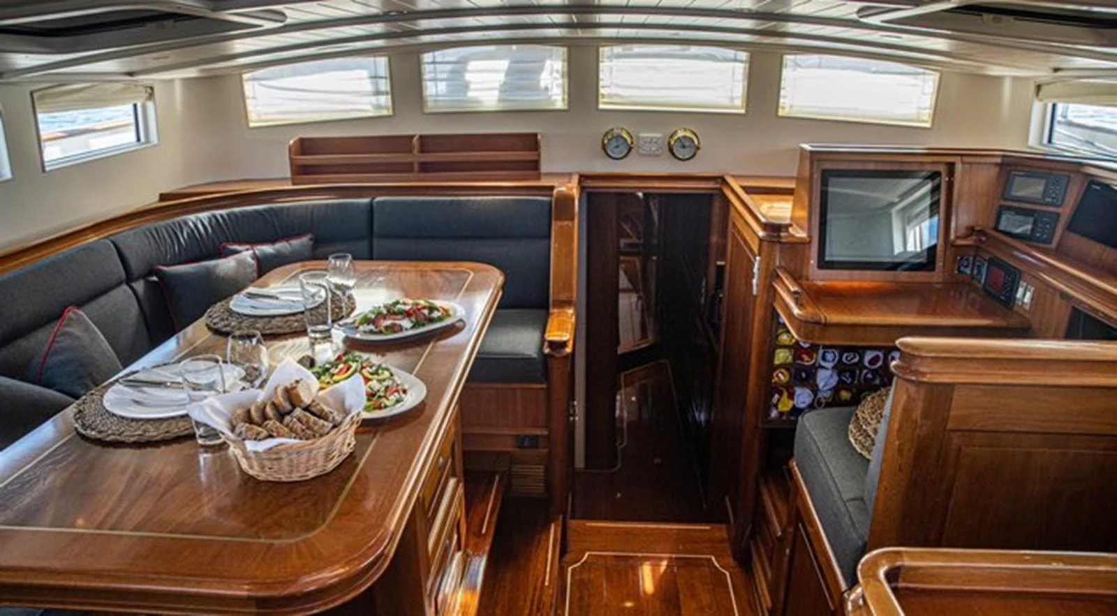 a dining table in a cabin aboard ATALANTE Yacht for Sale