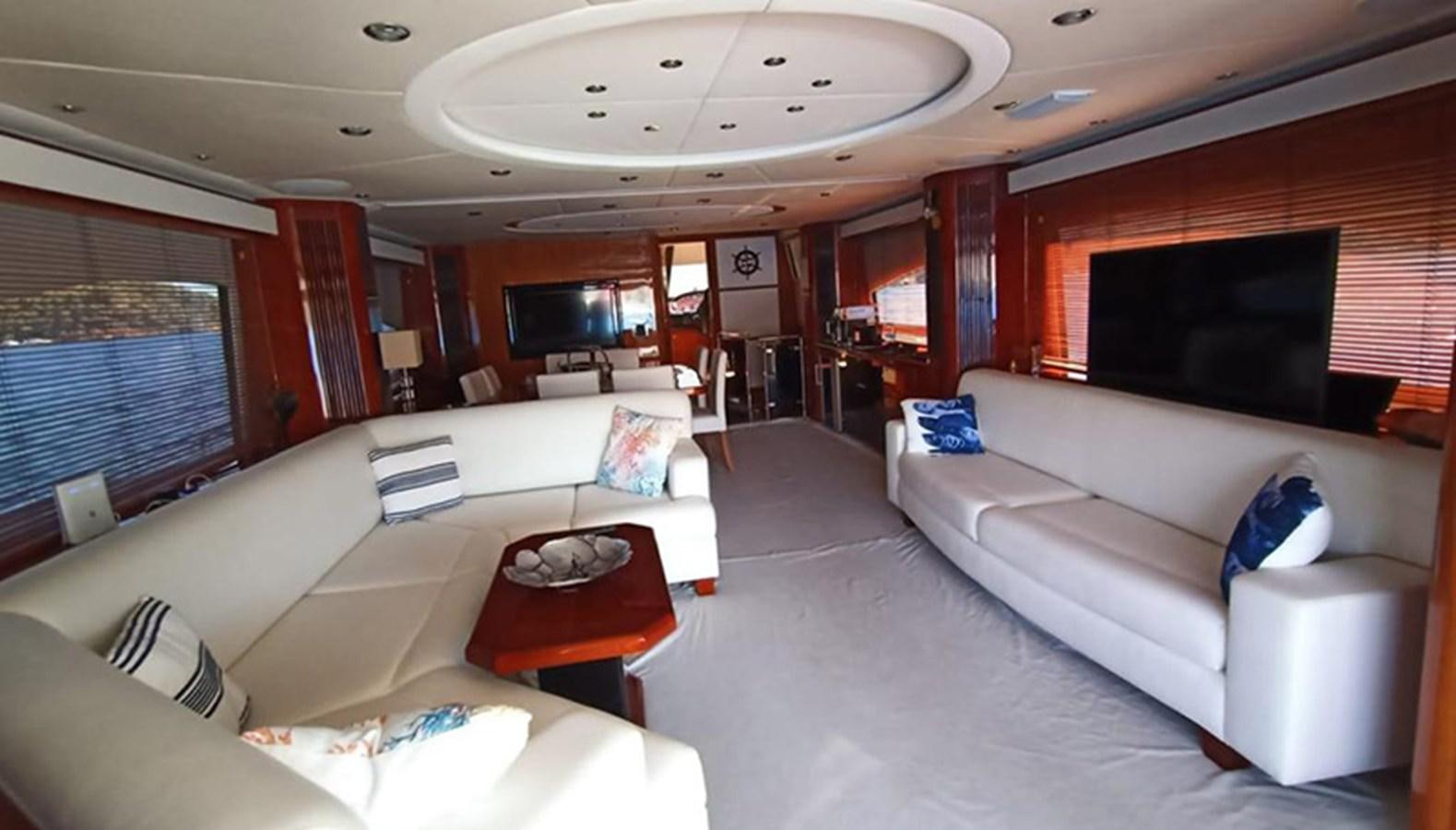 a living room with a large screen aboard 94 YACHT Yacht for Sale