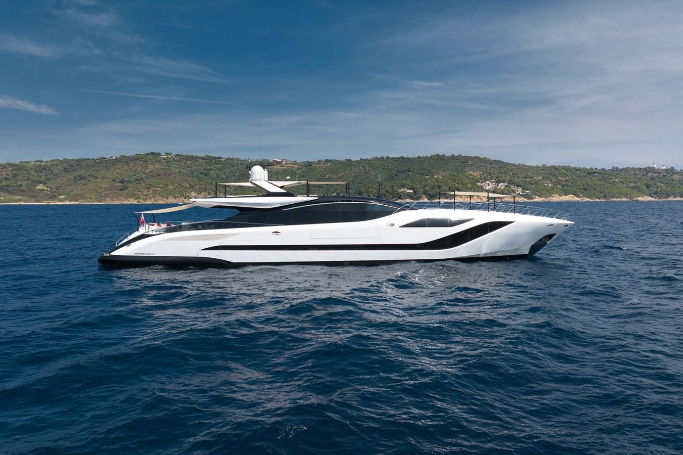 a white boat in the water aboard N1 Yacht for Sale
