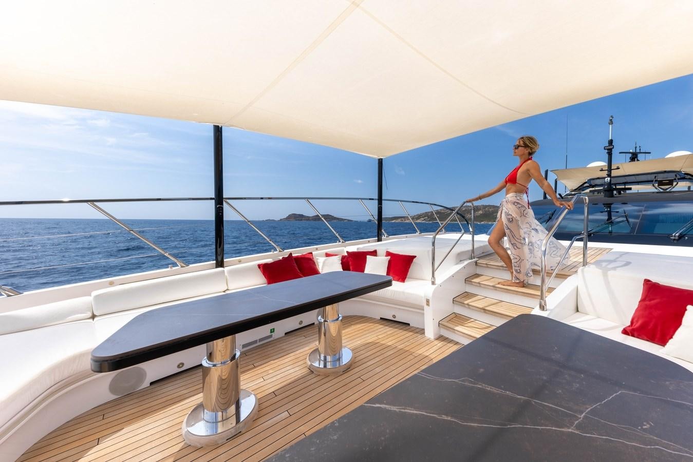a person sitting on a boat aboard N1 Yacht for Sale