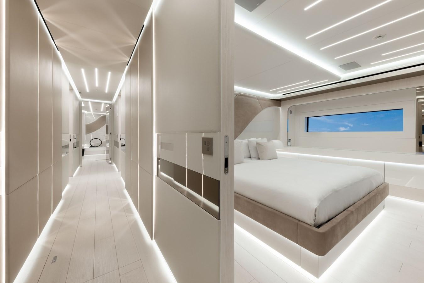 a room with a bed and a window aboard N1 Yacht for Sale