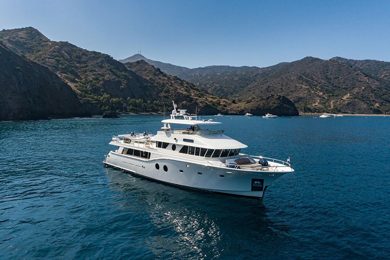 a white yacht in the water aboard WICKED COOL Yacht for Sale