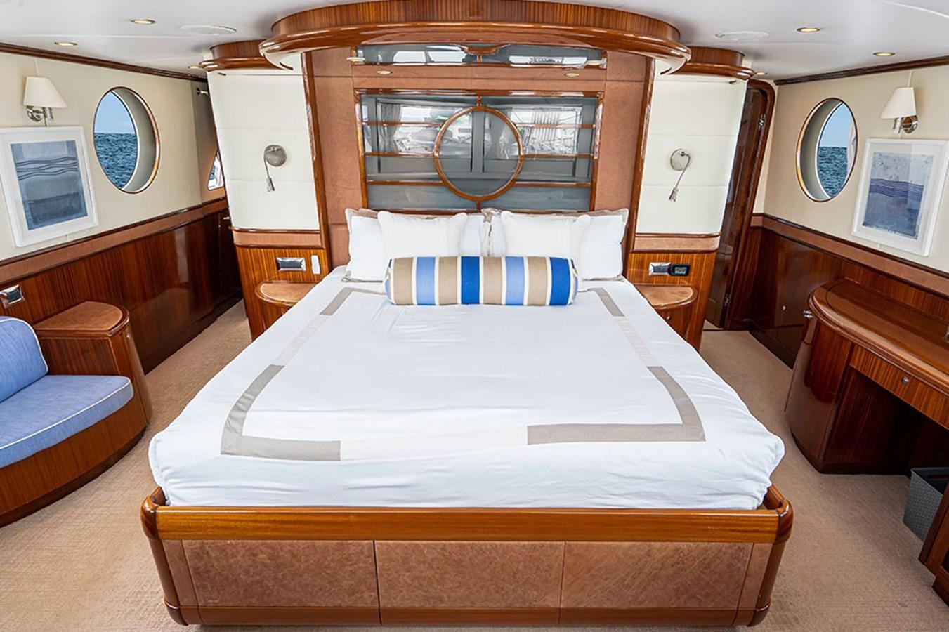a bed in a room aboard WICKED COOL Yacht for Sale