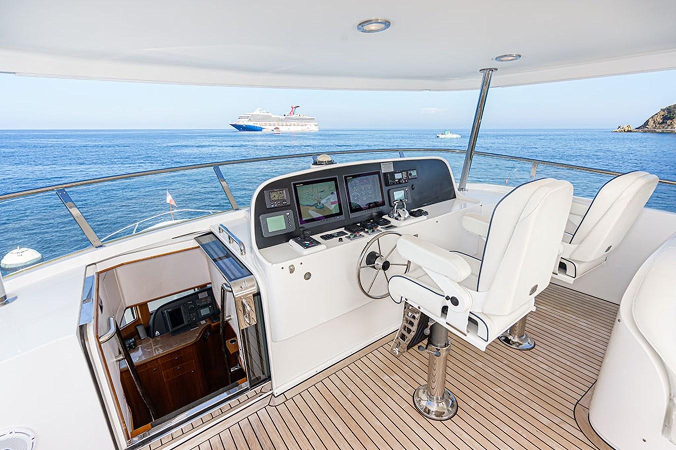 a boat on the water aboard WICKED COOL Yacht for Sale