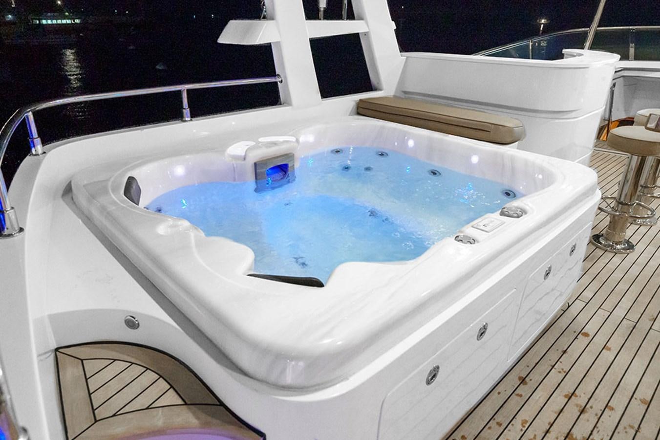 a white tub with a blue lid aboard WICKED COOL Yacht for Sale