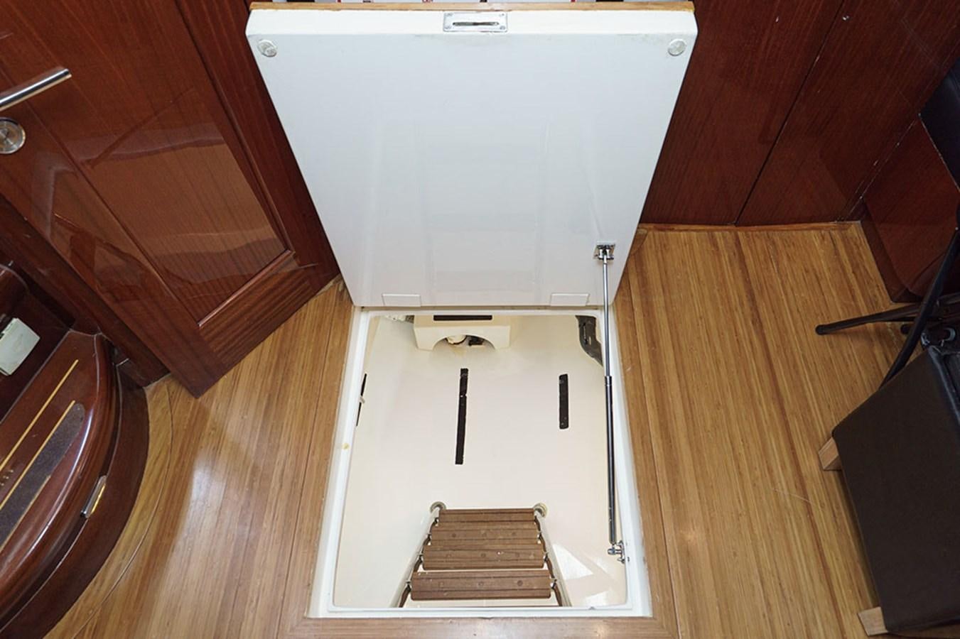 a piano in a room aboard WICKED COOL Yacht for Sale