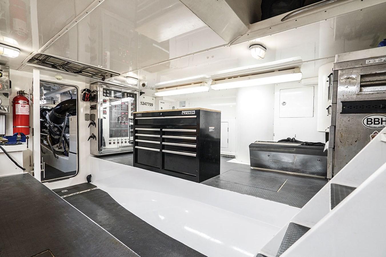a large industrial kitchen aboard WICKED COOL Yacht for Sale