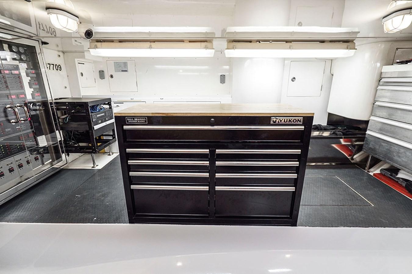 a large industrial machine aboard WICKED COOL Yacht for Sale