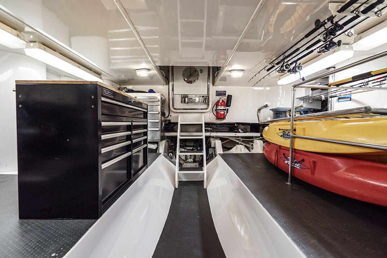 a large room with machines aboard WICKED COOL Yacht for Sale