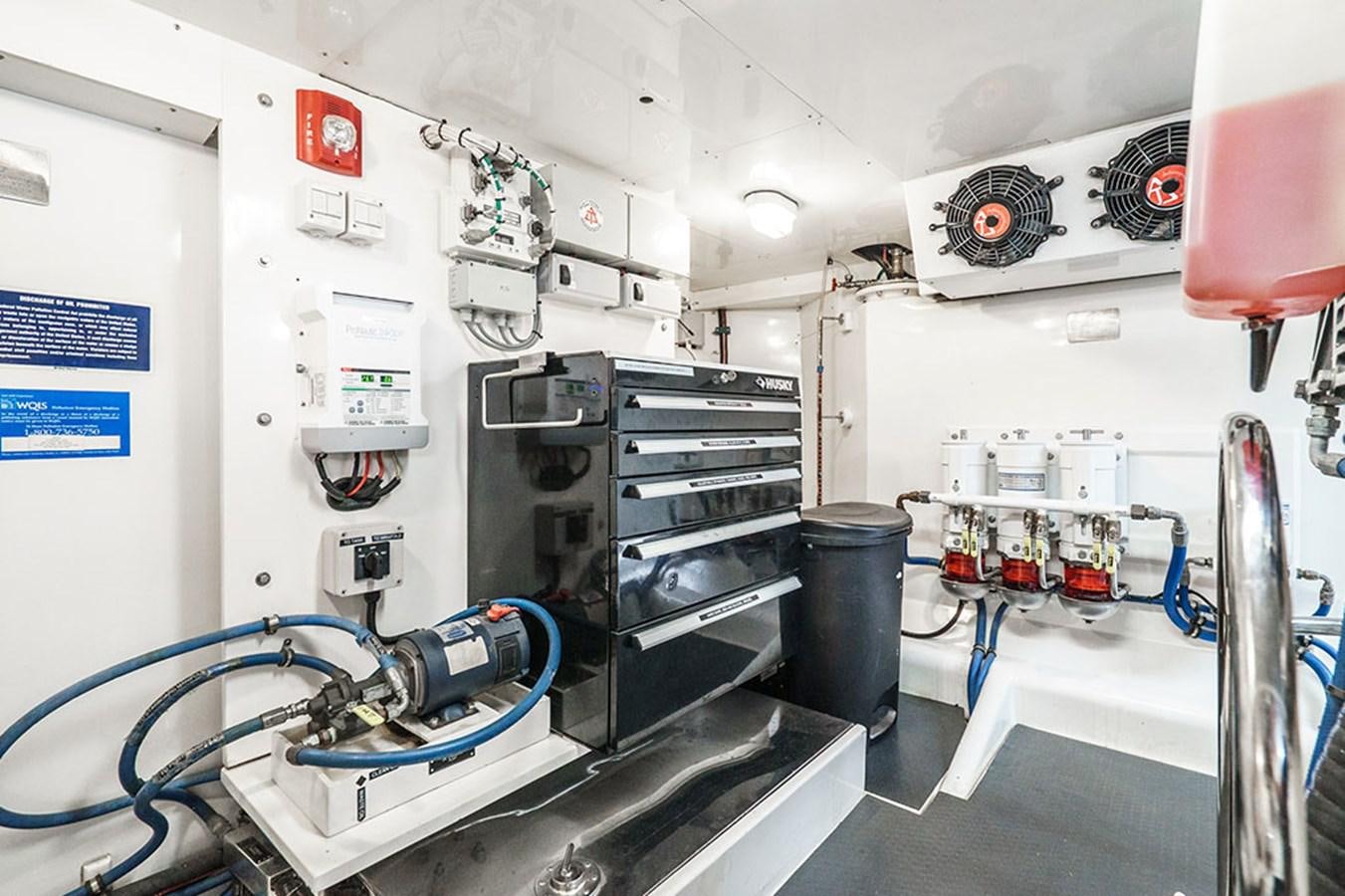 a room with machinery and equipment aboard WICKED COOL Yacht for Sale