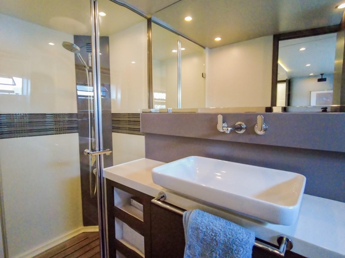 a bathroom with a sink and a shower aboard MELITEA Yacht for Sale