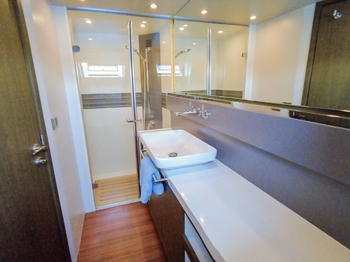 a bathroom with a large tub aboard MELITEA Yacht for Sale