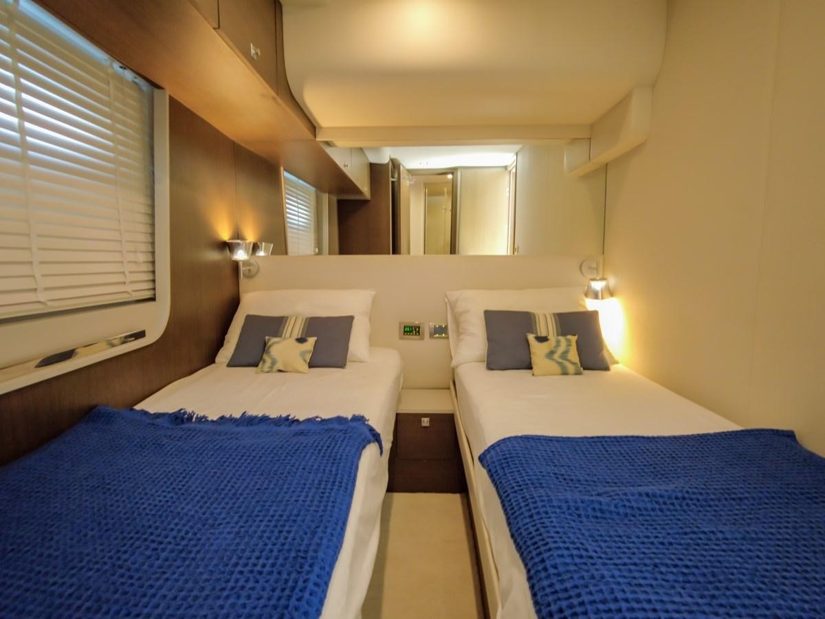 a couple of beds in a hotel room aboard MELITEA Yacht for Sale