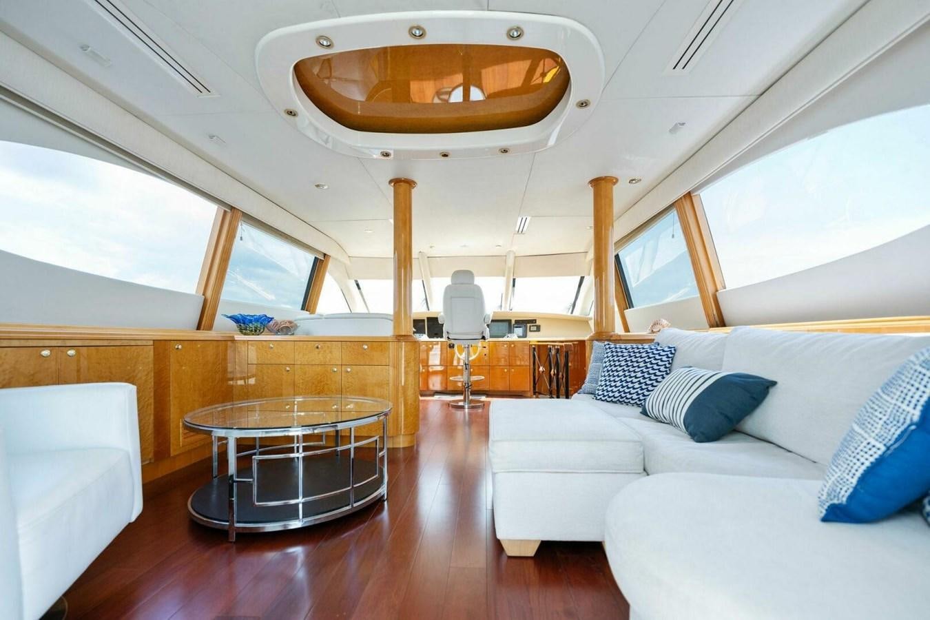 a room with a couch and a table aboard NORDLYS Yacht for Sale