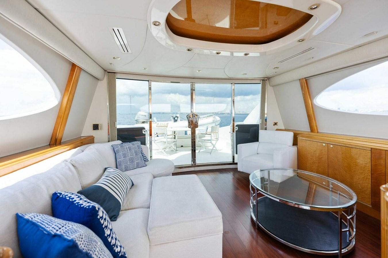a living room with a large window aboard NORDLYS Yacht for Sale