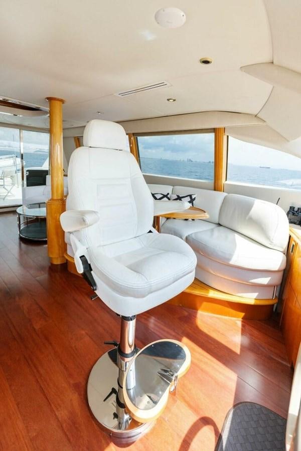 a white chair in a room aboard NORDLYS Yacht for Sale