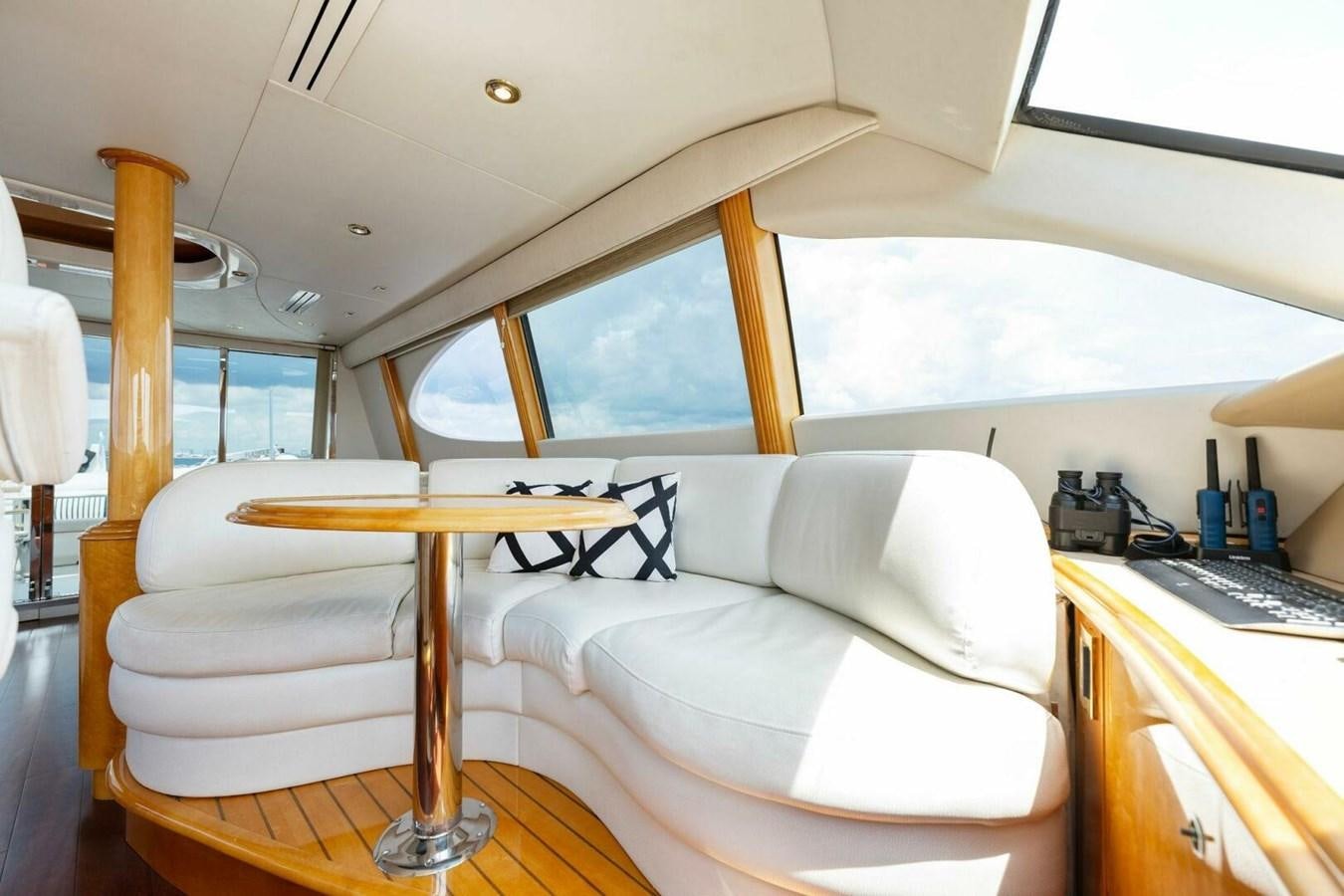 a room with a table and chairs aboard NORDLYS Yacht for Sale