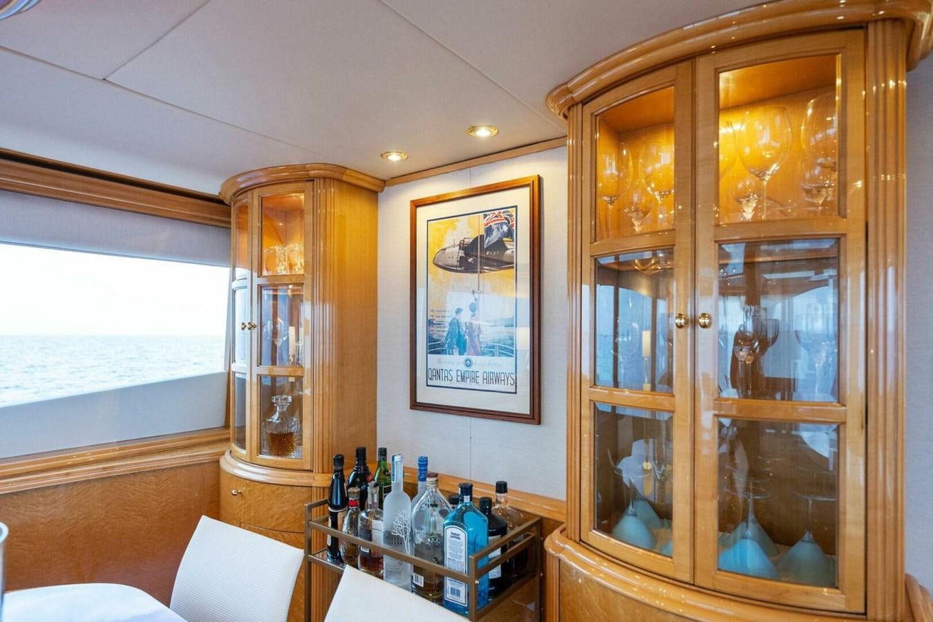 a glass cabinet with a picture on it aboard NORDLYS Yacht for Sale